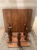 table top, four turned legs with casters, support boards