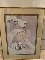 Full view of framed puppy print showing image, mat and frame