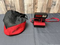 Camera and soft case side by side