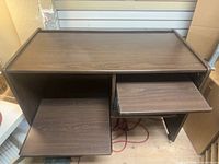 Front angled view showing pull-out trays and finish
