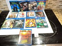 All 13 Blu-ray cases laid out on white surface