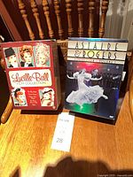 Front view of both sealed DVD box sets