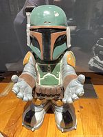 Front view of moulded foam Boba Fett figure, arms extended