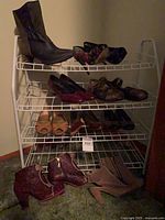 Full rack with assorted shoes and boots