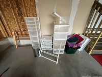Overall lot showing drawer towers, bins, drying rack, trash can