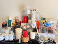 full lot of assorted candles and holders
