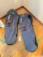 Two Mountain Profile carrying cases marked M and L