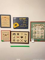 All five wall hangings mounted on wall