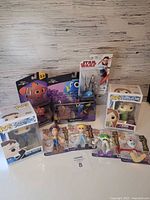 All nine packaged toys arranged on tabletop