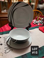 Dinner plate, side plate and bowl showing swirl pattern