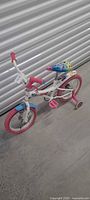 Full view of Disney 16" childrens bicycle with training wheels
