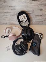 All four headphone sets grouped together on tabletop