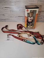Full lot showing boxed Lemieux bobble head and three lanyards