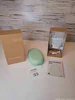 Label maker with box, cable, manual visible