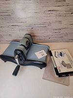 Full view of Big Shot machine with handle, platform and cutting pads