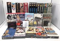 Front overview of all VHS tapes standing and lying flat