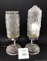 Both lamps together front view showing design and height difference