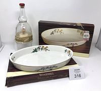 Woodhill baker boxes, one baker, Bols bottle