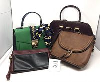 Group shot of the four ALDO handbags