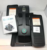 Top view showing Cubii JR2+ unit with both pedals and manual