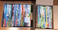 Two boxes containing rows of Disney Classics hardcover books