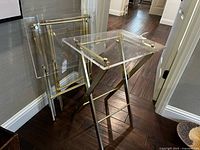 One table opened with three folded tables behind