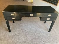 Full view of black campaign desk front and top