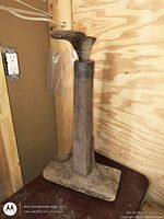 Full view of shoe cobbler anvil standing upright