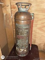 Front view showing instruction plate, hose and overall condition