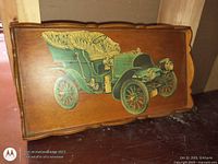 Front view of wooden tray with vintage car illustration