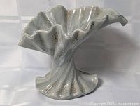 Full view of fluted pottery vase