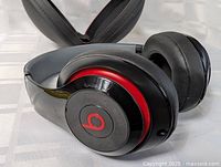 Close-up of Beats headphones showing ear cups and logo