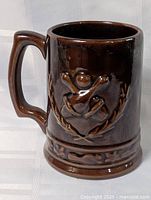 Full view of brown glazed Beauceware mug front