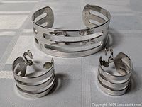 Full set showing bracelet and both earrings