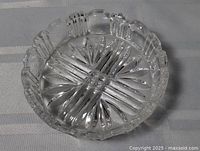 Top view showing scalloped rim and starburst base