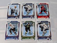 All six Upper Deck Victory Rookie cards laid out