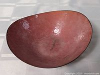 Top view showing pink enamel interior and overall shape