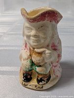 Front view showing full Toby creamer