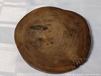 Top view showing full round wood disc and grain