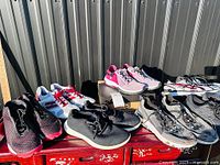 All six pairs of sneakers displayed side by side
