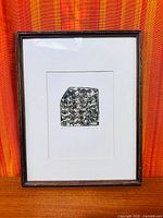 Front view of framed etching with mat and frame