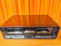 Full front view of Technics double cassette deck, shows both cassette wells and control panel