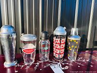 Group shot of all five shakers lined up