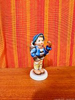 Front angled view of entire figurine