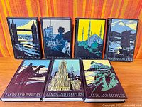 Front covers of seven Lands and Peoples volumes