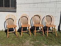 Front view of four matching spindle back chairs