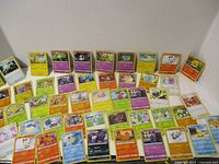 Full spread of all 50 cards laid out face-up