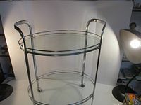 Full view of chrome frame trolley with two glass shelves