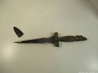 Full dagger with tip cover displayed