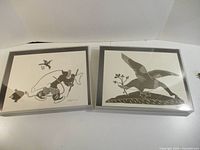 Both Inuit prints side by side showing overall condition and size